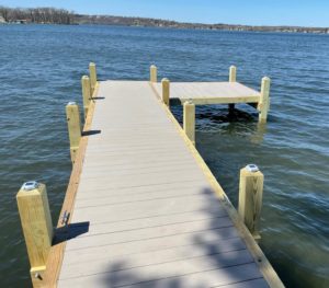 Wood dock with solar lighting and composite decking.
