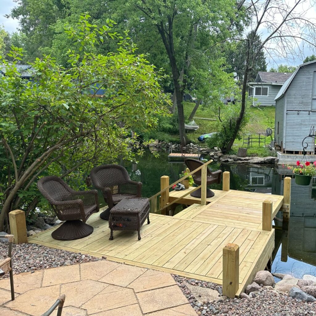 Custom wood dock platform on the Oconomowoc River in Wisconsin built by Rock Docks
